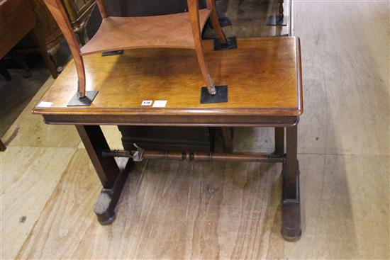 19th century mahogany rectangular stretcher table with trestle end supports(-)